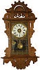 Seth Thomas "Hanging Balltop", "Hanging Eclipse", or just plain old walnut hanging clock, suit yourself.