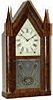 Steeple clock, "Patent Spring Eight Day Brass Clocks, Made and Sold by, M.W.Atkins, Bristol., Conn", copied from the full label, inside the case, ca 1850.