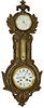 French bronzed metal wall clock with working thermometer and barometer, ca 1900, more or less.