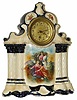 English porcelain clock stamped "Made in England" and some other things I can't read. Some cobalt blue was used, a lot of cream, the flower paintings, and the 4 lookers on the front.