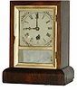 William L. Gilbert and Co. miniature cottage clock.