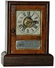 Seth Thomas "Cottage Extra", ca 1865. Great little 9.5 inches high mahogany veneer case, gilt around the glasses mostly still intact.
