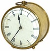 French brass tin can clock, 4 inches high plus the loop handle. Rests on two ball feet.
