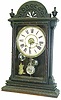 Waterbury Clock Co., shelf "Albany", ca 1891. 24 inches high walnut case, original finish.