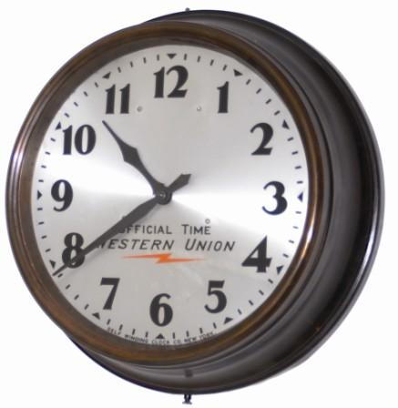 Self Winding Clock Co. spun copper gallery clock, with an oxidized bronze finish. — Antique Clocks Price Guide