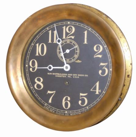 Chelsea Clock Co. Navy/Ships clock, large brass case and black dial. — Antique Clocks Price Guide