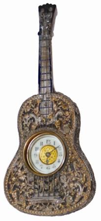 A rare work of art by, "The British United Clock Co. / Birmingham, England", and is patented in Britain and France, all that information printed on the back plate. — Antique Clocks Price Guide
