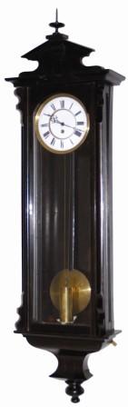 German one weight Vienna regulator, ca late 1800's. Streamlined ebonized wood case is long and thin, stands around 48" high, has three good glasses, wall levelers, and a door latch. — Antique Clocks Price Guide