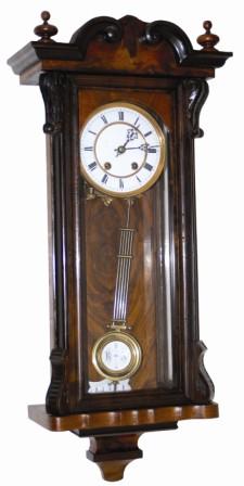 Lenzkirsch fancy RA walnut case, very clean and polished, standing only 28" high. Not as fancy as some of this collection but has much style. — Antique Clocks Price Guide