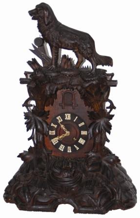 Shelf cuckoo with St. Bernard dog motif. — Antique Clocks Price Guide