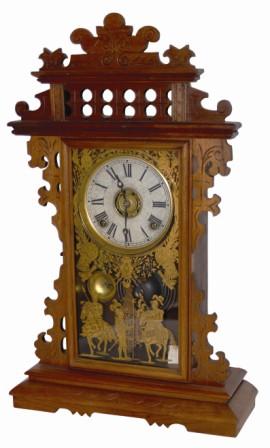 E. N. Welch Clock Co. walnut parlor clock, with an always poplar glass featuring the Roman army and their variety of weapons scattered all around the glass. — Antique Clocks Price Guide