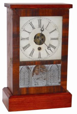 Wm. L. Gilbert "Cottage No. 2", ca 1860. Pine case is 11.5" high, mahogany veneered only on the door. — Antique Clocks Price Guide