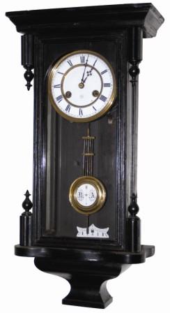 Junghans RA wall clock. It is missing a top piece and the bottom finials, otherwise a nice case, 23" high as it is. — Antique Clocks Price Guide