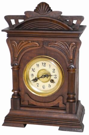 Junghans shelf clock, ca 1920's. Art deco type case is 16" tall, clean, has the original finish, and is a very attractive walnut case with nicely designed ornaments. — Antique Clocks Price Guide