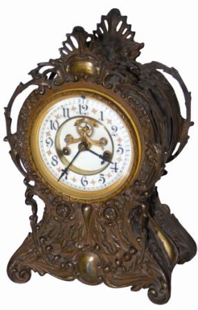Waterbury Clock Co. metal clock, ca 1900. — Antique Clocks Price Guide