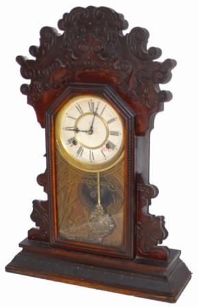 Waterbury Clock Co. walnut parlor clock. — Antique Clocks Price Guide