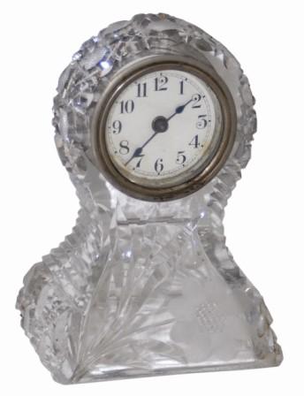 The Lux Clock Mfg. Co., signed on the dial of this cut glass clock case. — Antique Clocks Price Guide