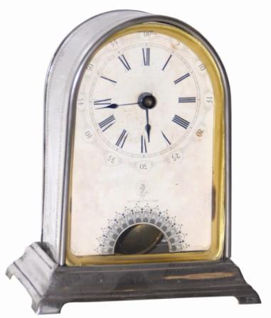 Jerome nickel plated alarm clock, identical to No. 672 except it has an alarm, ands the 6" high case is exceptionally nice and clean. — Antique Clocks Price Guide
