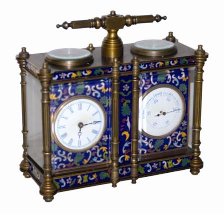 Double carriage clock, brass case, beveled glasses all around and inlay on all sides. Round beveled glasses over the balance movement on the left and over the compass on the right. — Antique Clocks Price Guide