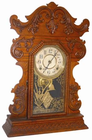 E. N. Welch Clock Co. oak kitchen clock, a model they simply named, "No. 15", ca 1900, one of 24 clocks they numbered 1 thru 24. — Antique Clocks Price Guide