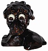 Oswald "Poodle" made of a composition material which dates it to the 1950's. It is a medium sized Oswald, standing 5.5" high, and has a very good original finish.