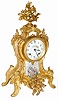 New Haven Clock Co. metal case clock finished in ormolu gold plate and retaining most of the gold.
