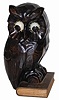 German Oswald Uhrenfabrik, Wise Old Owl clock, stands 7.5" high, made of molded composition and a pine base.