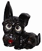 German Oswald Scottie Dog, made of molded composition, ca 1955. Six inch high case is signed and there is a label underneath.