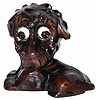 German, Oswald, carved composition poodle, 5.5" high, and in excellent condition.