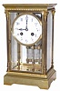 French crystal regulator, not real big but it does have some style. The brass case is not hardly 10.5" high, has four full, fluted columns on the corners, with cast capitals and bases.