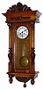 German RA type wall clock. Medium sized walnut case is 33" high, exceptionally nice and clean, carved top, base, columns, and even carved finials.