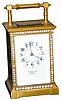 French 8 day carriage clock, time and strike, ca 1885. This 7.25" high case is dressed with clear stones around the front edge.