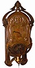 German Art Nouveau wall clock, ca 1920's. This is a heavy oak cased clock and it stands 32" high.