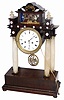 Austrian silk thread suspension mantle clock. You either like this type Austrian clock or you despise them, no in between.