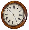Winterhalder and Hofmeier gallery clock, ca 1880. Solid plate brass movement is 8 day, time only, signed by the company, and original to this English type, pegged case.