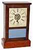 Wm. L. Gilbert "Cottage No. 2", ca 1860. Pine case is 11.5" high, mahogany veneered on the door.
