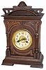 Junghans shelf clock, ca 1920's. Art deco type case is 16" tall, clean, has the original finish, and is a very attractive walnut case with nicely designed ornaments.