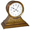 French brass/bronze, tambour style clock, ca 1885. Cast designs of leaves, grapes, and vines over the entire case.