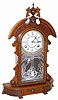 Waterbury Clock Company walnut parlor clock, "Hecla", ca 1881. At first glance you think the case is missing some finials, it isn't.