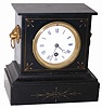 French marble clock, small and cheap. Incised designs on the front, gold filled, case is complete and has no breaks or repairs, only the usual microscopic edge nicks.