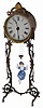 Bobbing Doll Clock, metal case is 14.5" high.
