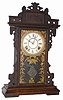 E. N. Welch walnut parlor clock. There are two labels on the back, deteriorated but you can see the Welch name clearly.