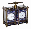Double carriage clock, brass case, beveled glasses all around and inlay on all sides. Round beveled glasses over the balance movement on the left and over the compass on the right.
