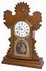 E. Ingraham Clock Co. walnut parlor clock, "Tulip", ca 1895.