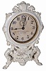 Novelty-alarm clock. Metal case painted white with some gold highlights, stands 9.5" high.