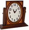 Waltham swing frame dresser/desk clock. The wood case is 12" wide, 10" high, some inlay around the dial frame, and overall in very nice clean, complete, condition.