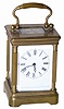 French Carriage clock, 8 day time only. It is only 4.5" high, has the back door knob and original handle on top.