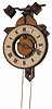 Swiss made novelty clock. The wood dial is signed, "buco Swiss".