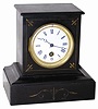 French miniature slate clock, only 8" tall. It may be small, but it is heavy, well made, and has the best of accessories, i.e. movement, dial, etc.