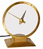 Jefferson Golden Hour Clock, ca 1949. The metal case is 9" tall and finished in gold.